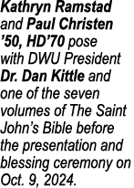 Kathryn Ramstad and Paul Christen ’50, HD’70 pose with DWU President Dr. Dan Kittle and one of the seven volumes of T...