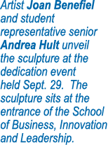 Artist Joan Benefiel and student representative senior Andrea Hult unveil the sculpture at the dedication event held    